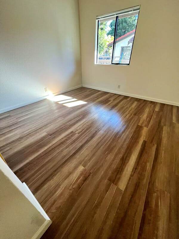 Hardwood floors, window.