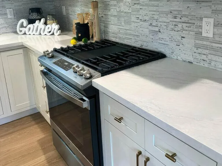 White, stainless steel, marble
