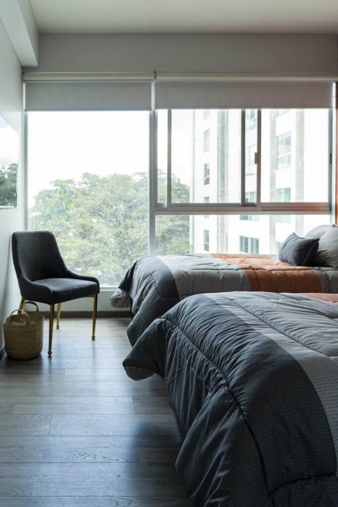 Two beds in a milpitas Airbnb room.